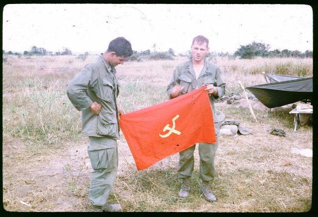 Capt. Kush and Lt __ with VietCong flag